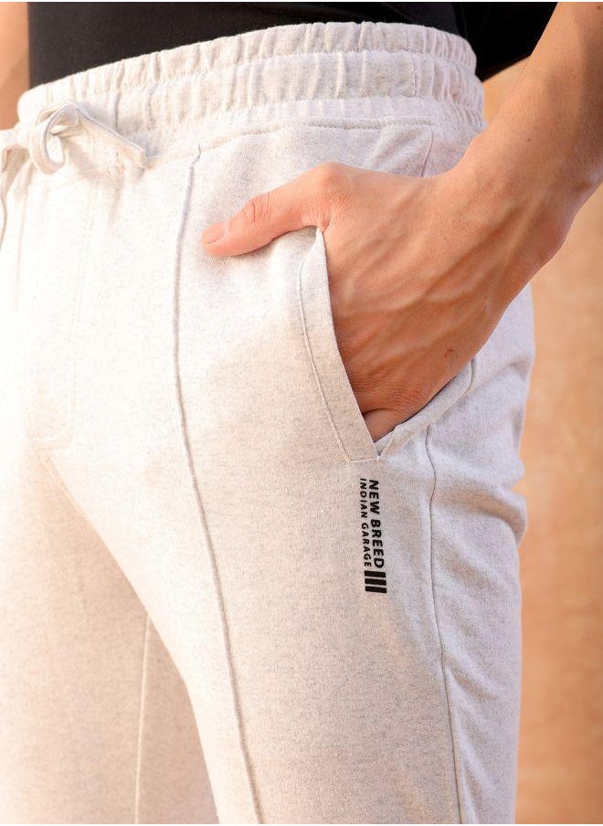 Men Slim Fit Solid Mid-Rise Stretchable Knitted Jogger Trousers