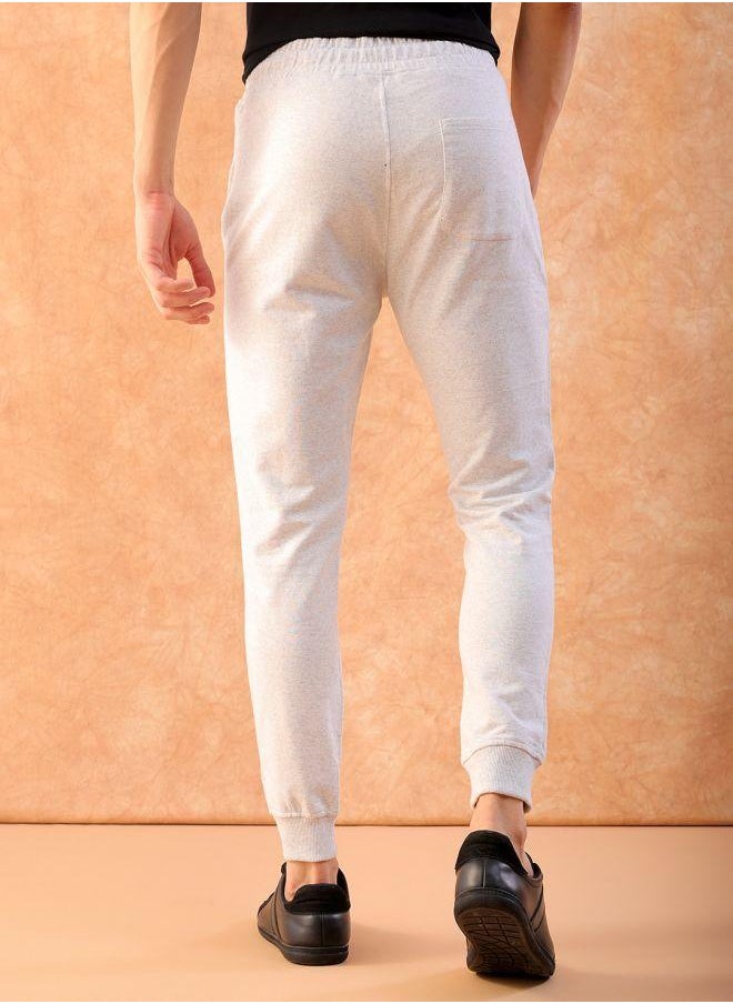 Men Slim Fit Solid Mid-Rise Stretchable Knitted Jogger Trousers