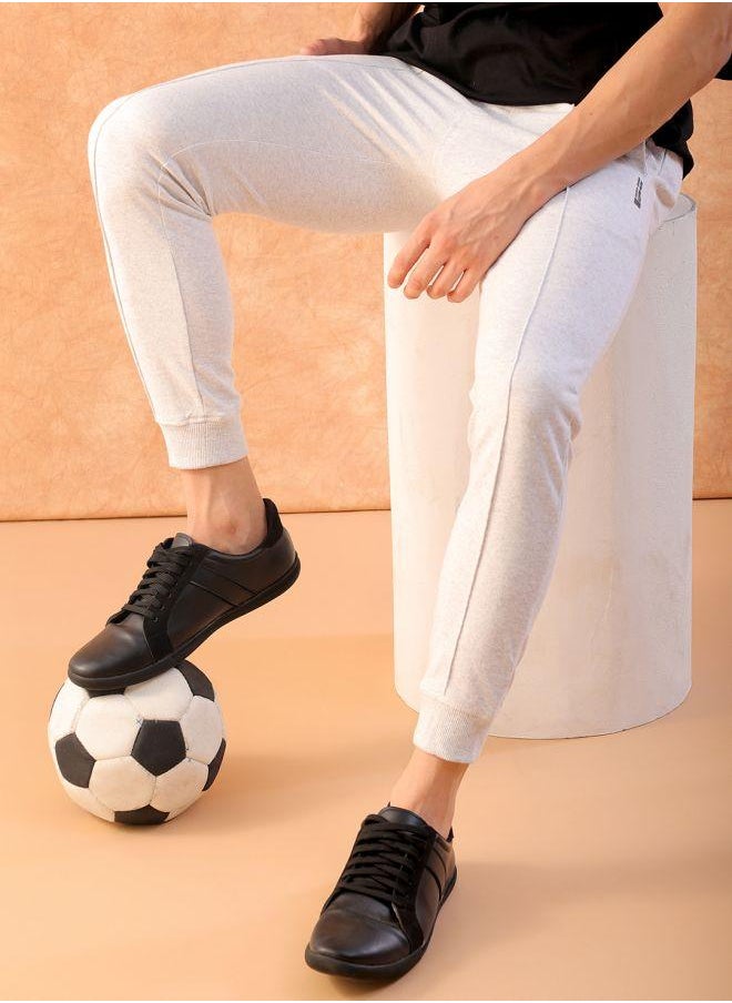 Men Slim Fit Solid Mid-Rise Stretchable Knitted Jogger Trousers
