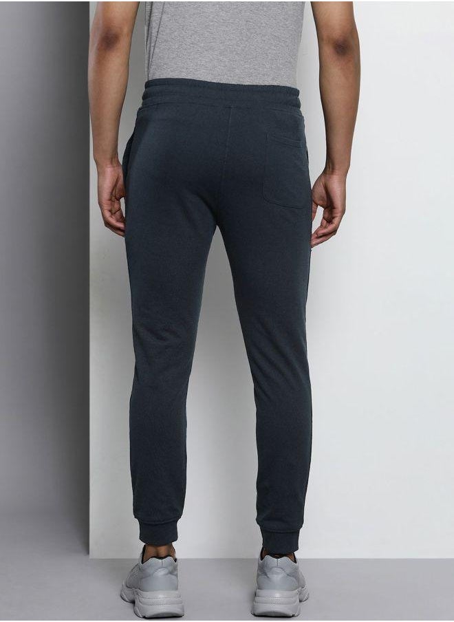 Men Slim Fit Solid Mid-Rise Stretchable Knitted Jogger Trousers
