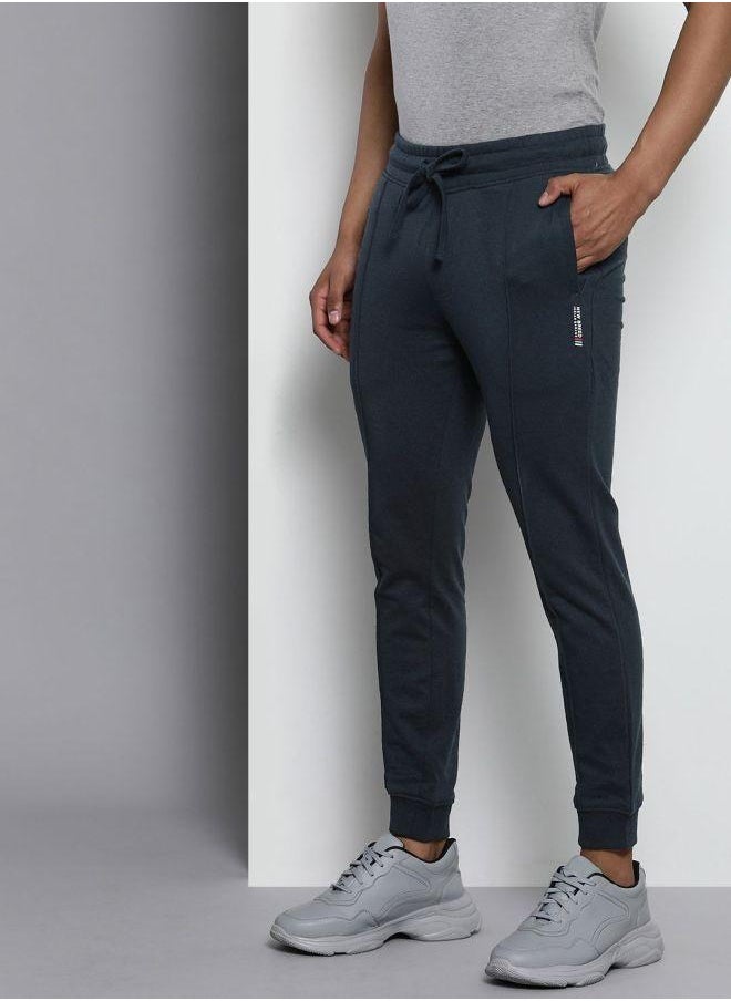Men Slim Fit Solid Mid-Rise Stretchable Knitted Jogger Trousers