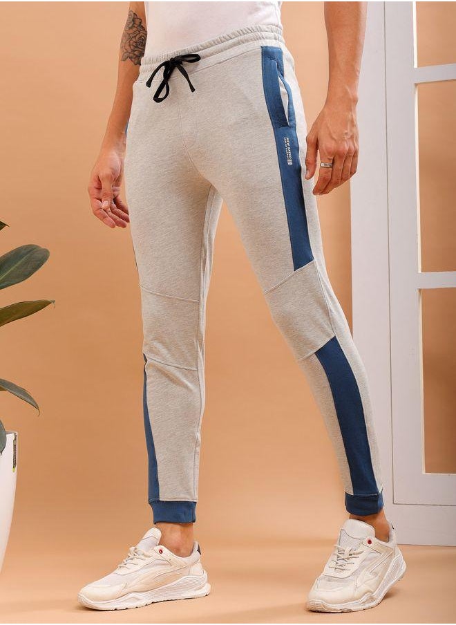 Men Slim Fit Solid Mid-Rise Stretchable Knitted Jogger Trousers