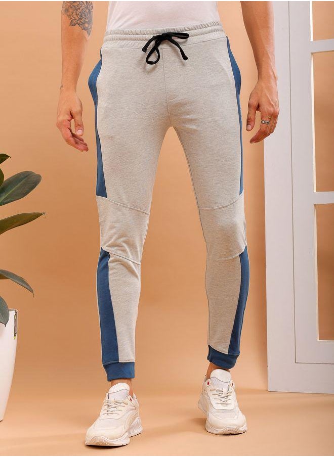 Men Slim Fit Solid Mid-Rise Stretchable Knitted Jogger Trousers