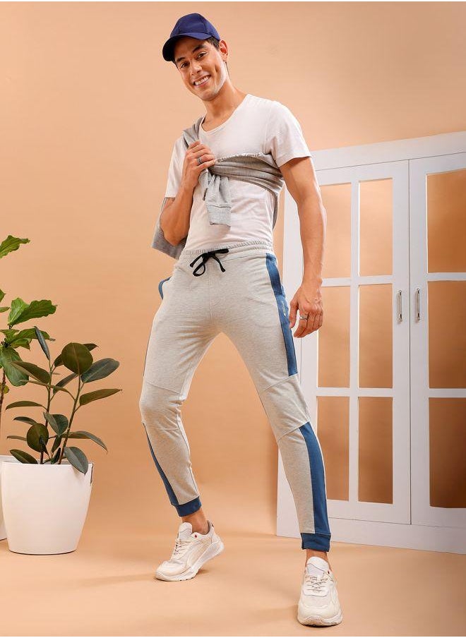 Men Slim Fit Solid Mid-Rise Stretchable Knitted Jogger Trousers