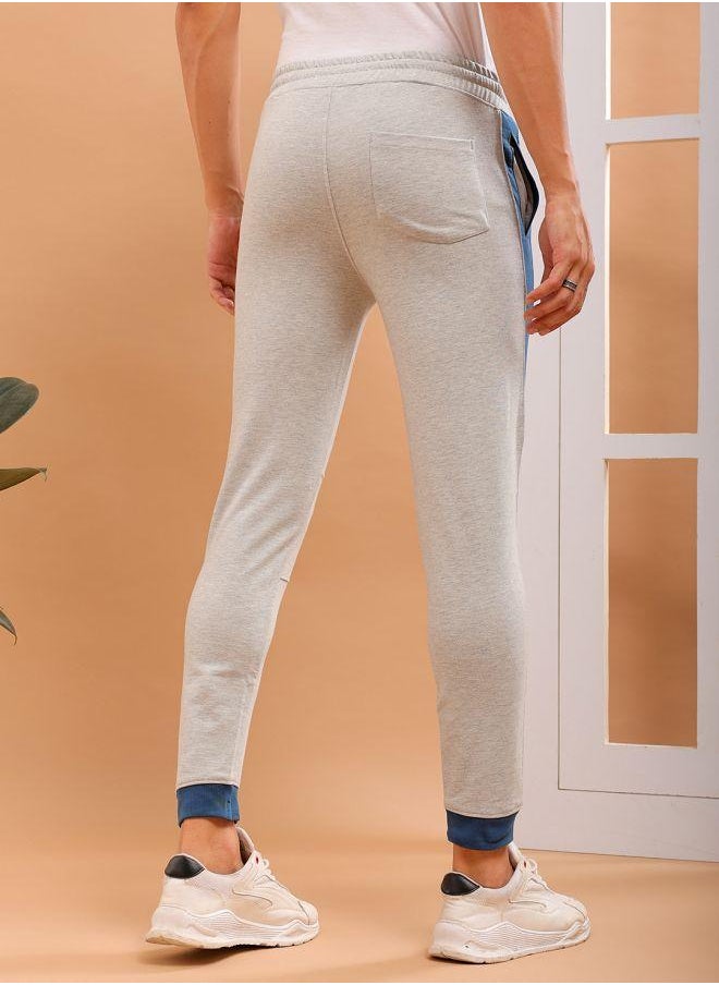 Men Slim Fit Solid Mid-Rise Stretchable Knitted Jogger Trousers