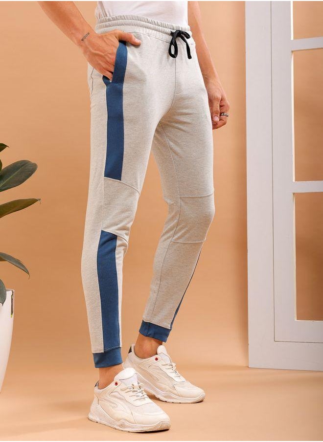 Men Slim Fit Solid Mid-Rise Stretchable Knitted Jogger Trousers