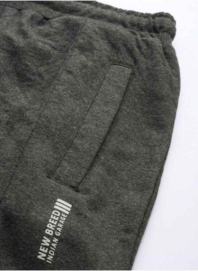 Men Slim Fit Solid Mid-Rise Stretchable Knitted Jogger Trousers