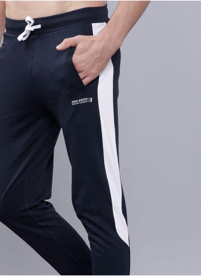Men Slim Fit Solid Mid-Rise Stretchable Knitted Jogger Trousers