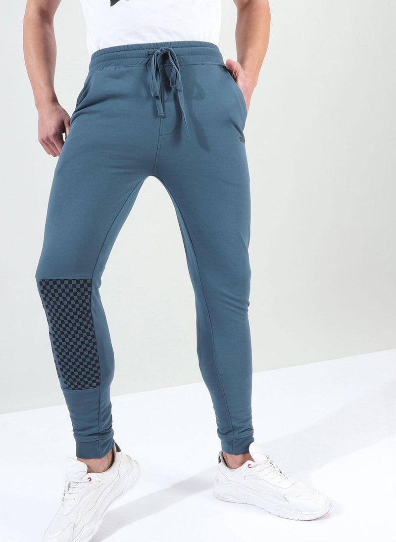 Men Slim Fit Solid Mid-Rise Stretchable Knitted Jogger Trousers