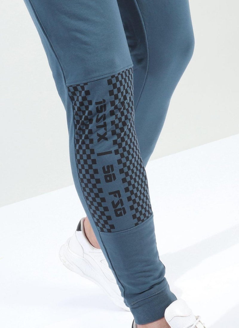 Men Slim Fit Solid Mid-Rise Stretchable Knitted Jogger Trousers