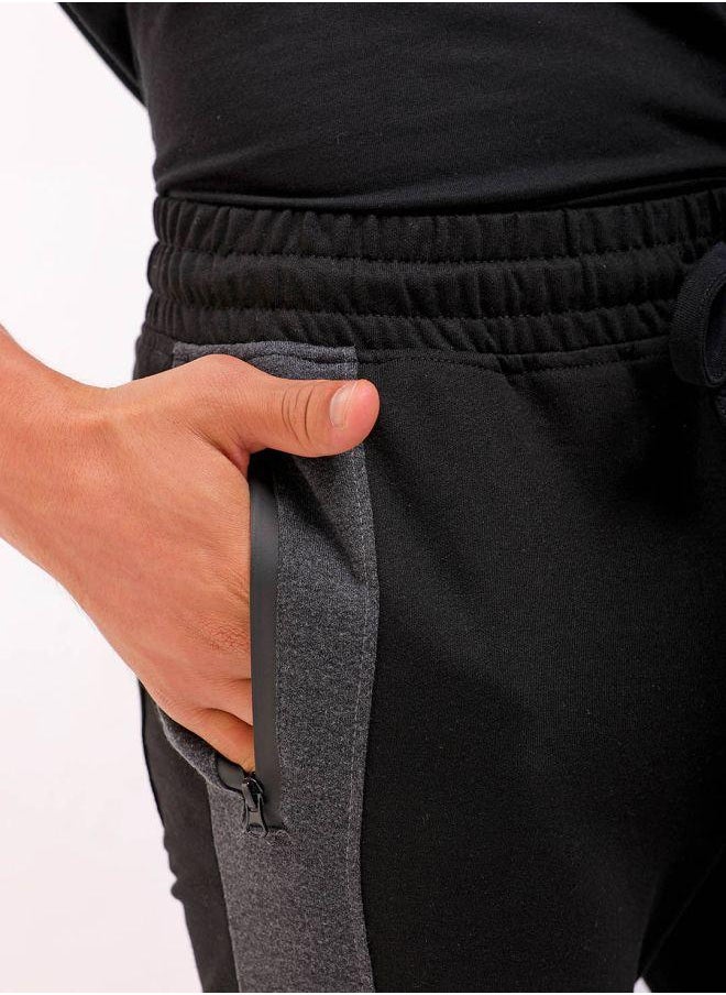 Men Slim Fit Solid Mid-Rise Stretchable Knitted Jogger Trousers