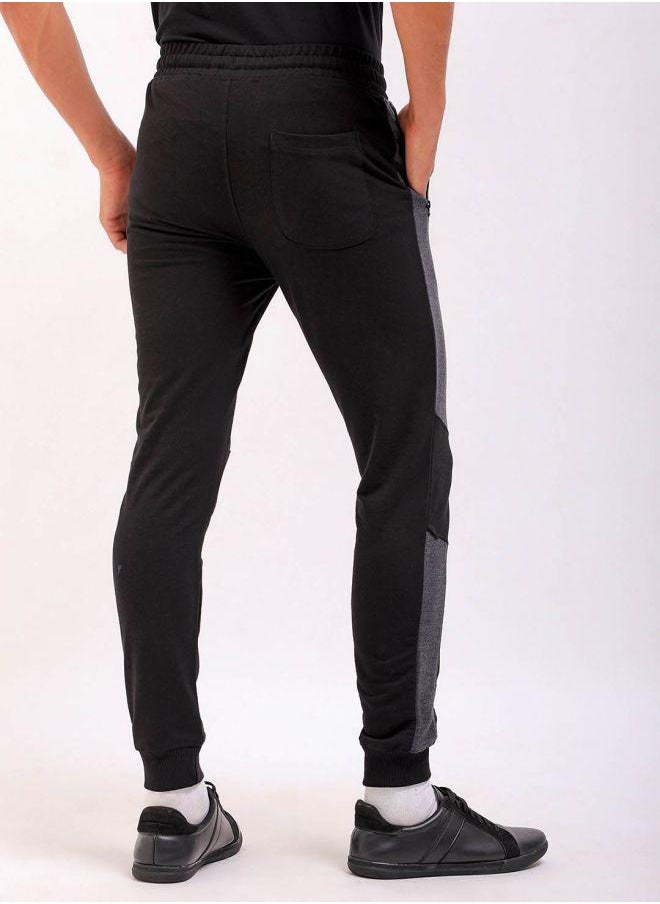 Men Slim Fit Solid Mid-Rise Stretchable Knitted Jogger Trousers