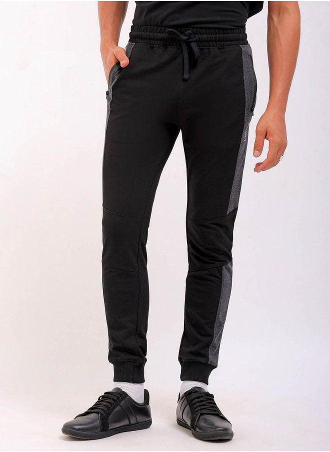 Men Slim Fit Solid Mid-Rise Stretchable Knitted Jogger Trousers