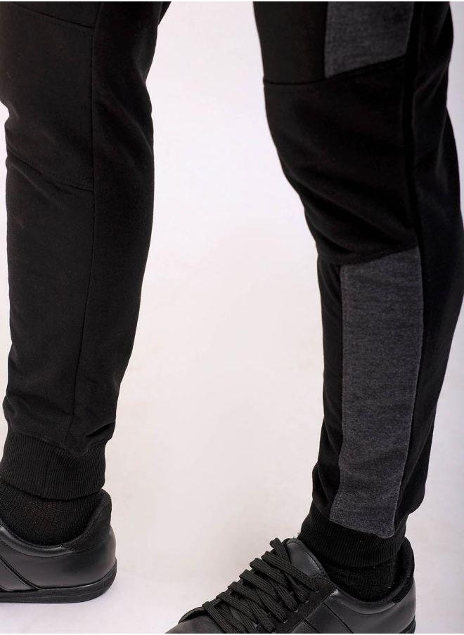 Men Slim Fit Solid Mid-Rise Stretchable Knitted Jogger Trousers