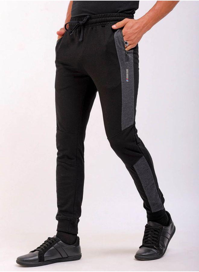 Men Slim Fit Solid Mid-Rise Stretchable Knitted Jogger Trousers