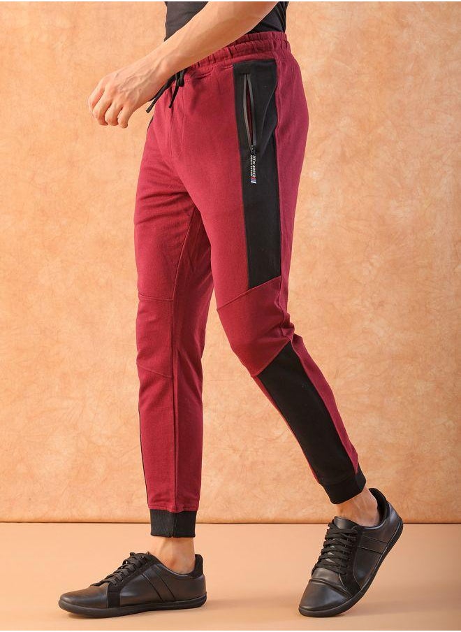 Men Slim Fit Solid Mid-Rise Stretchable Knitted Jogger Trousers