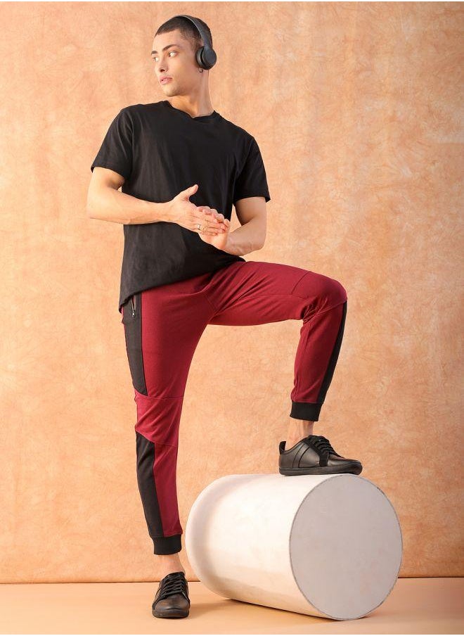 Men Slim Fit Solid Mid-Rise Stretchable Knitted Jogger Trousers