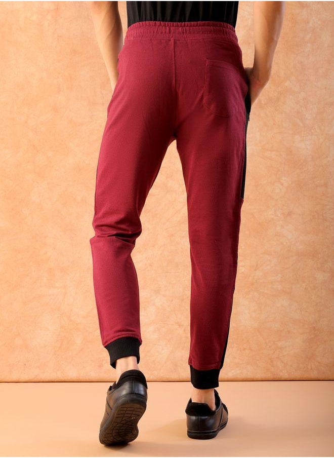 Men Slim Fit Solid Mid-Rise Stretchable Knitted Jogger Trousers