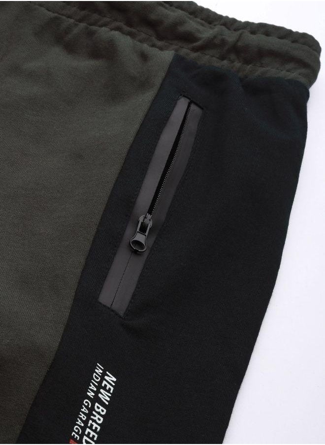 Men Slim Fit Solid Mid-Rise Stretchable Knitted Jogger Trousers