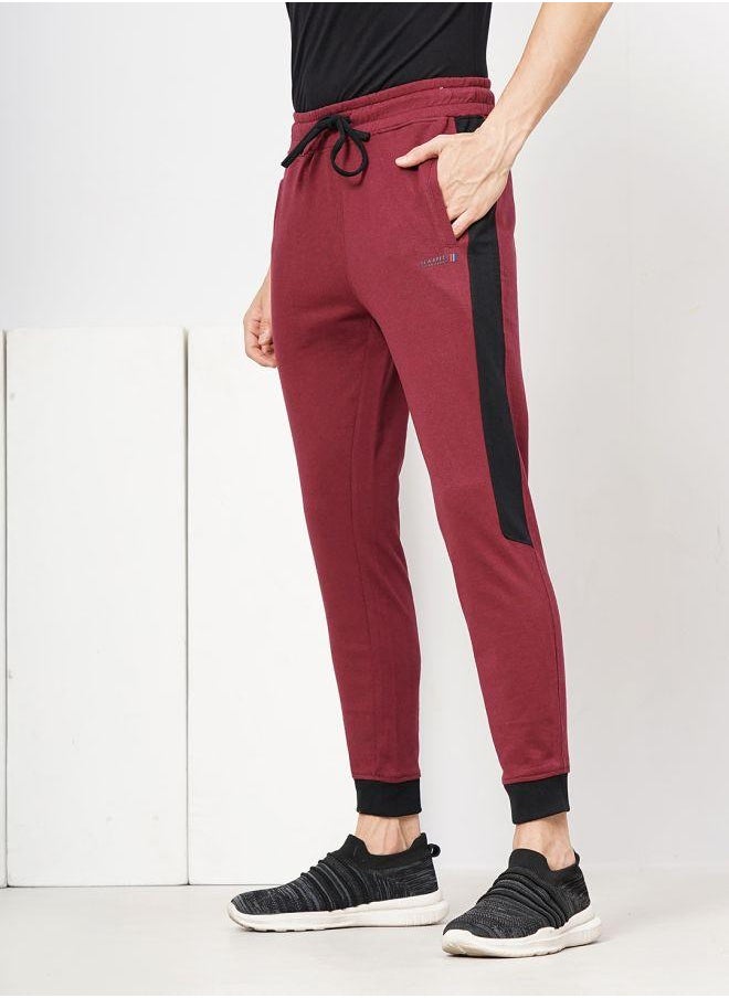 Men Slim Fit Solid Mid-Rise Stretchable Knitted Jogger Trousers
