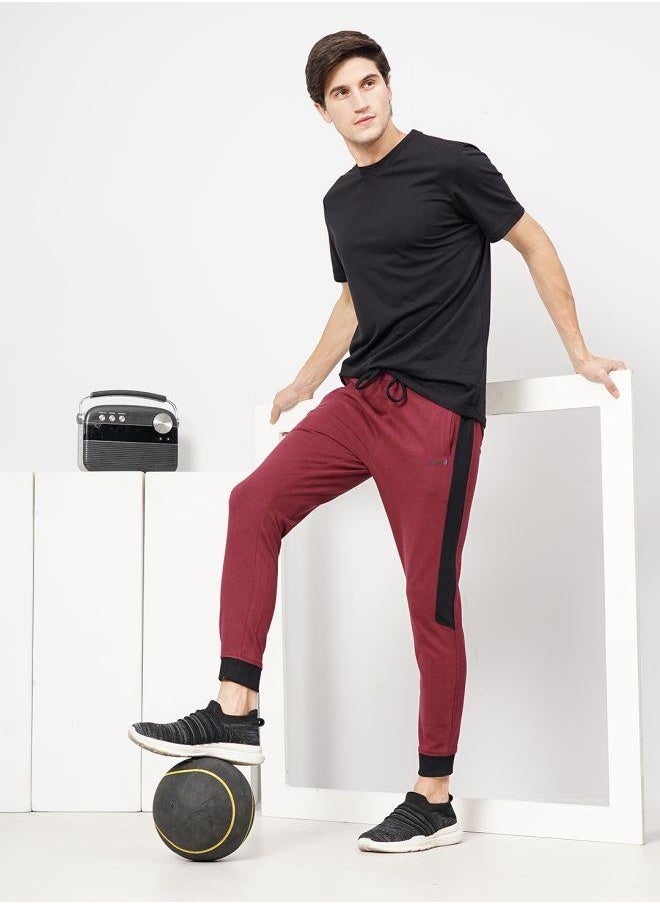 Men Slim Fit Solid Mid-Rise Stretchable Knitted Jogger Trousers