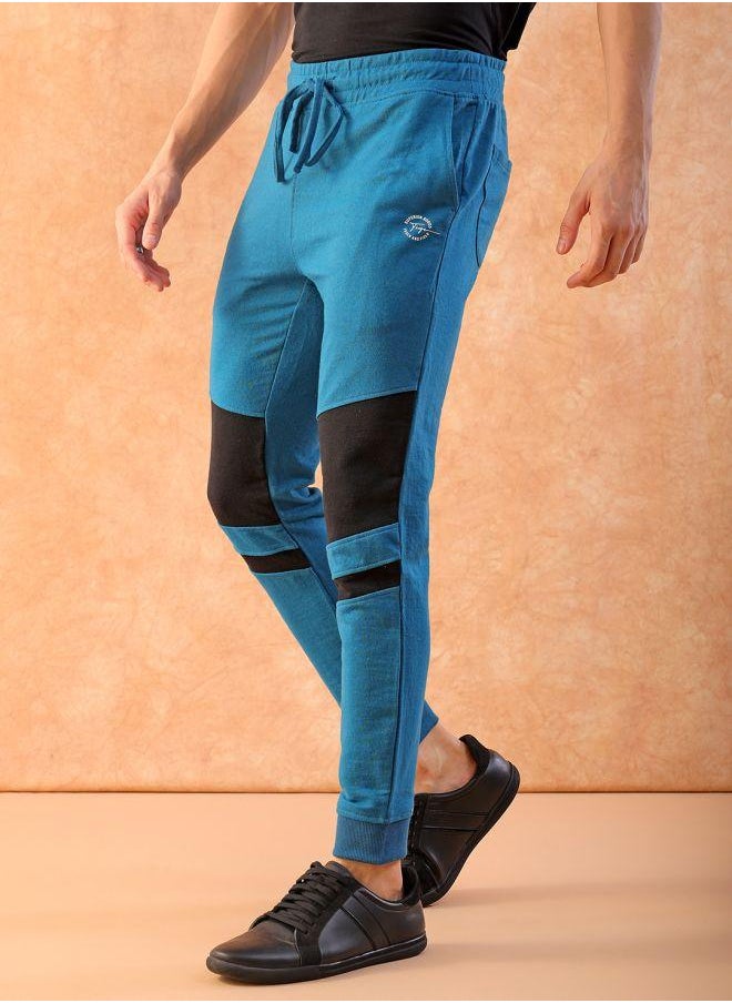 Men Slim Fit Solid Mid-Rise Stretchable Knitted Jogger Trousers