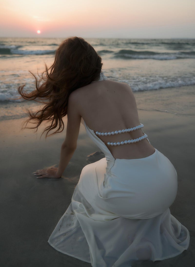 Satin maxi dress with pearl decor on the back