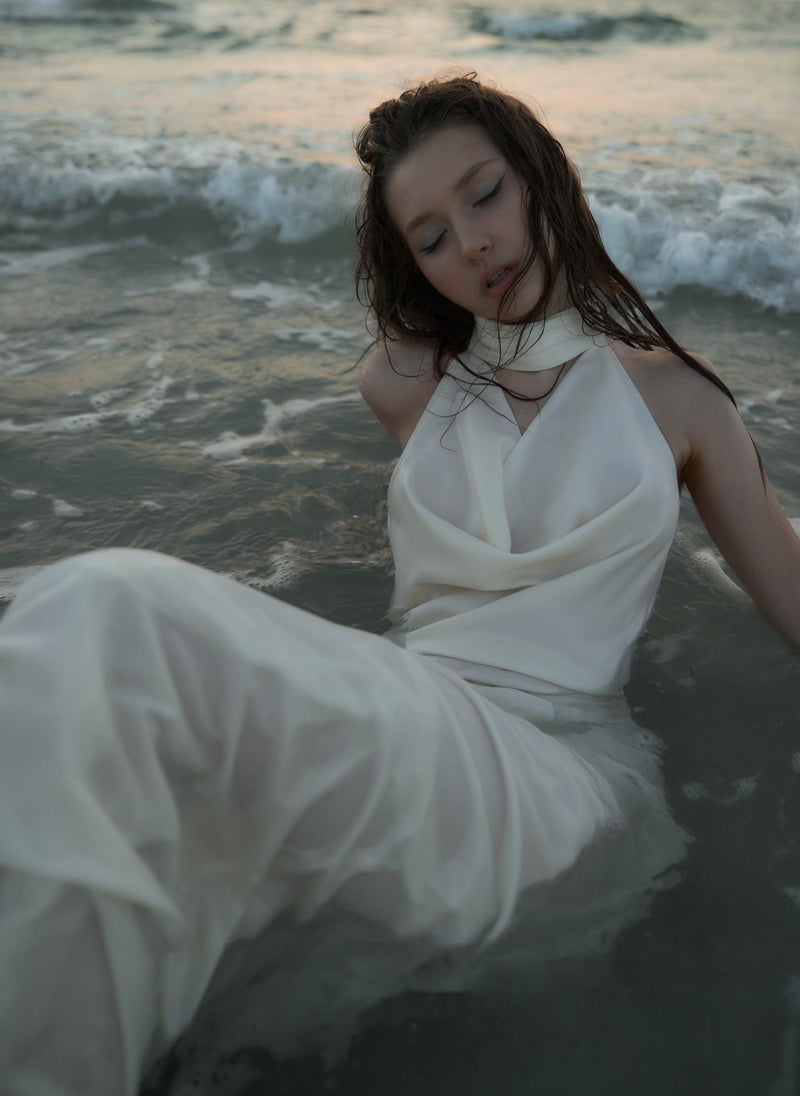 Satin maxi dress with pearl decor on the back