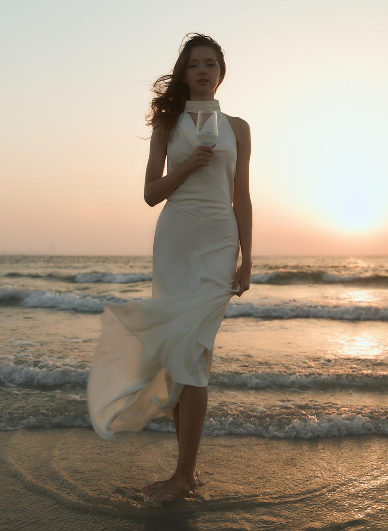 Satin maxi dress with pearl decor on the back
