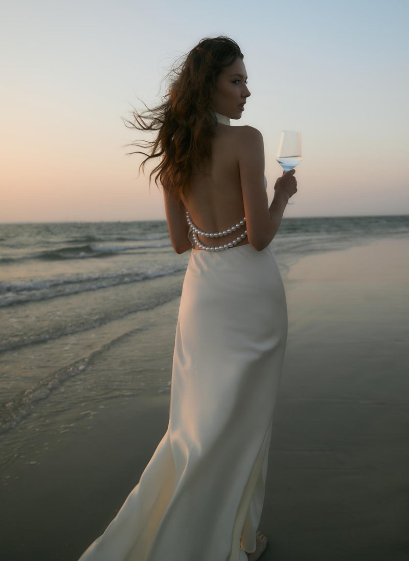 Satin maxi dress with pearl decor on the back